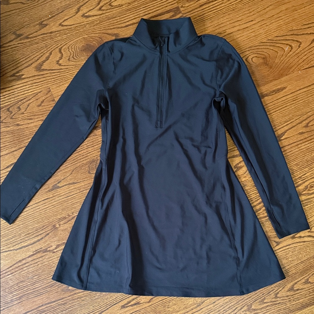 Never worn, black long sleeve athletic dress